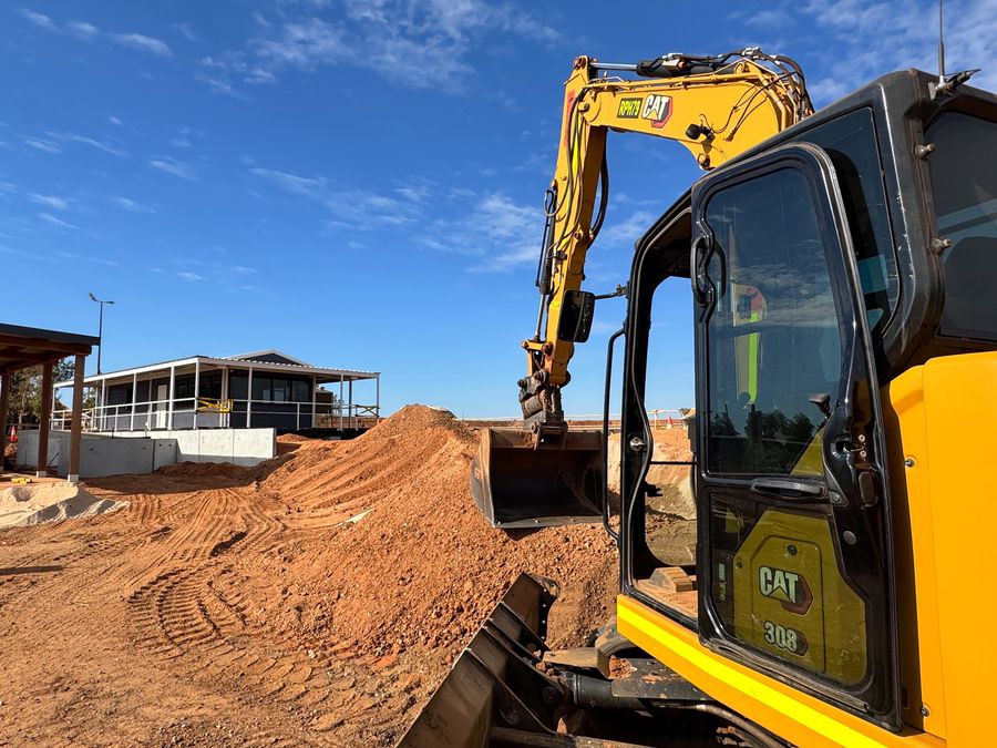 Excavator working on site